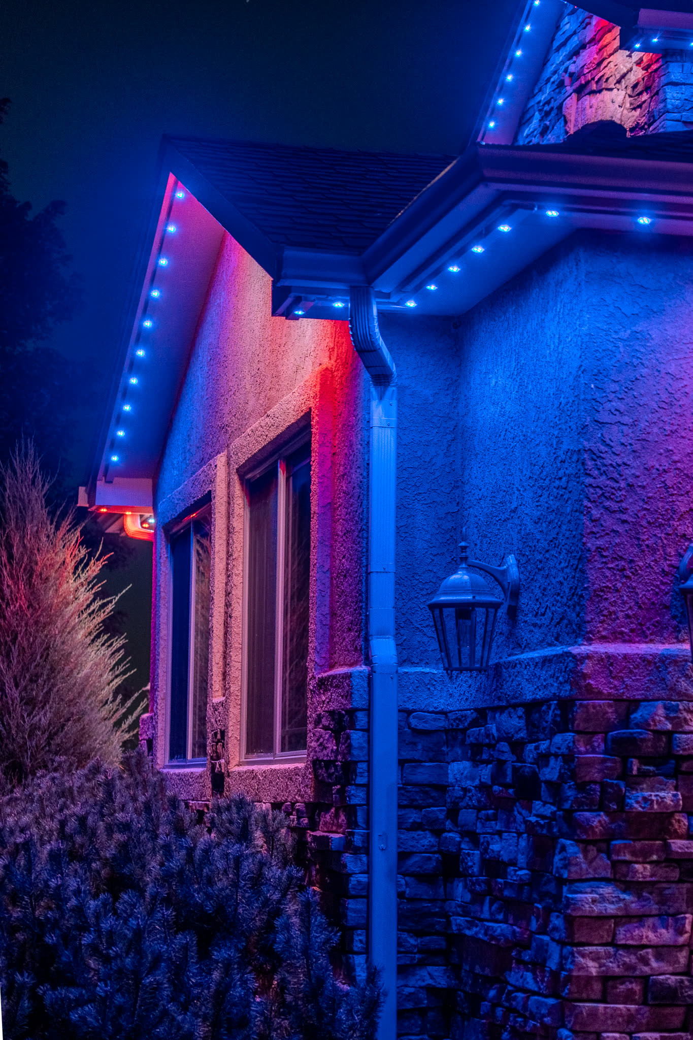 Home with red, white, and blue permanent LED lighting