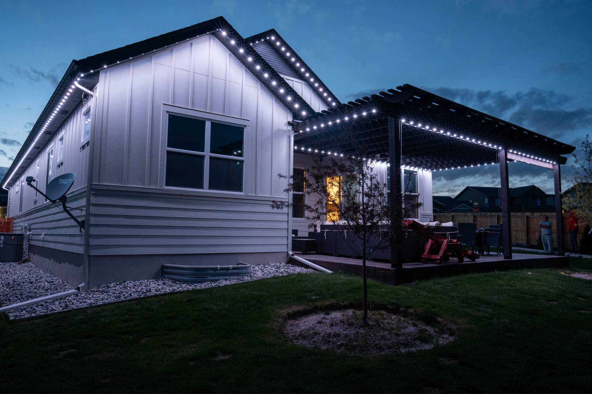 Home with bright white permanent LED security lighting