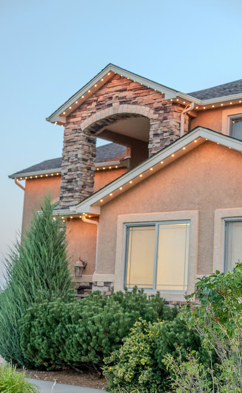Same home with warm white permanent LED accent lighting
